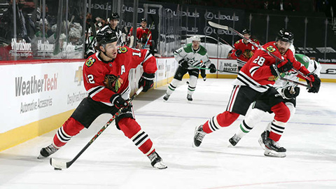 Alex DeBrincat (© Chase Agnello-Dean/NHLI via Getty Images)